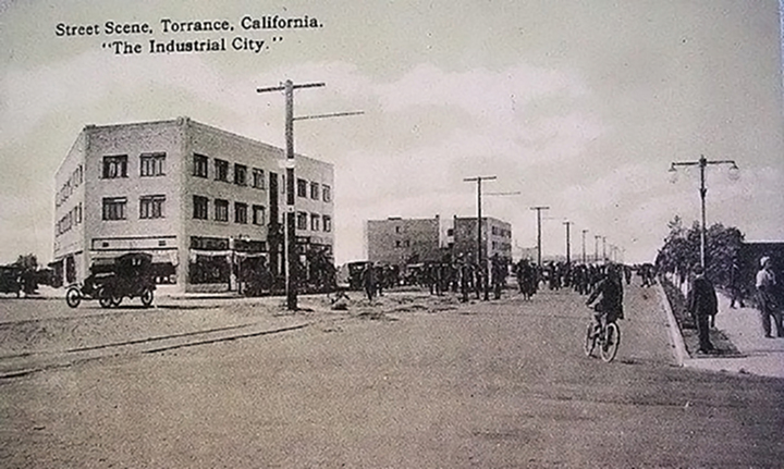 A postcard dated circa 1913 shows the Brighton and Colonial Hotel buildings on Cabrillo Avenue. The buildings were designed by architect Irving Gill as part of his imaging of the downtown core.