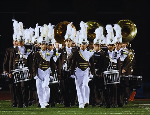 West High Band marching on a football field