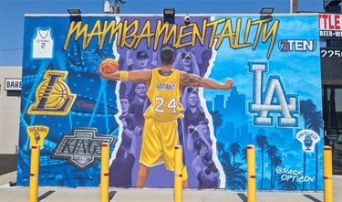 Mural at 310 Liquor Store featuring Kobe Bryant with “Mamba Mentality” above him.