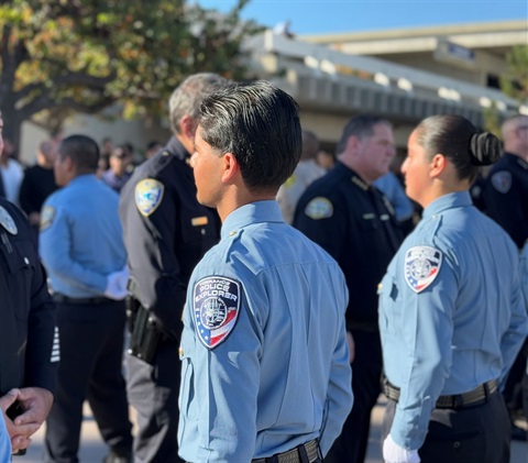 Back side of Police Explorer Program participants