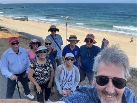 Image of group by the beach